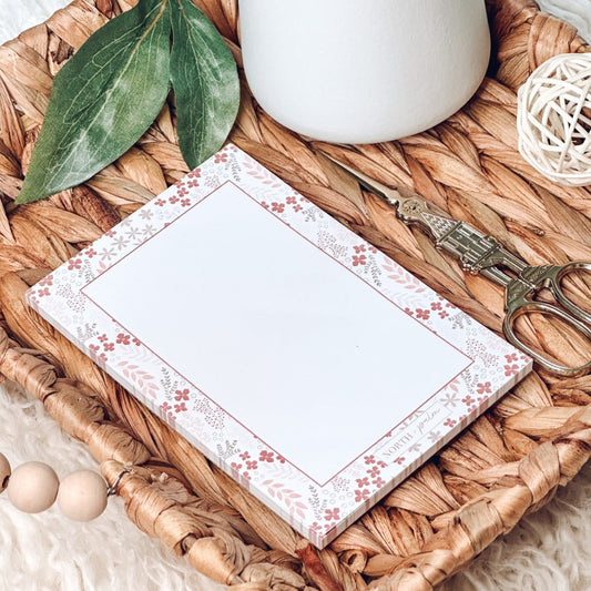 White floral notepad