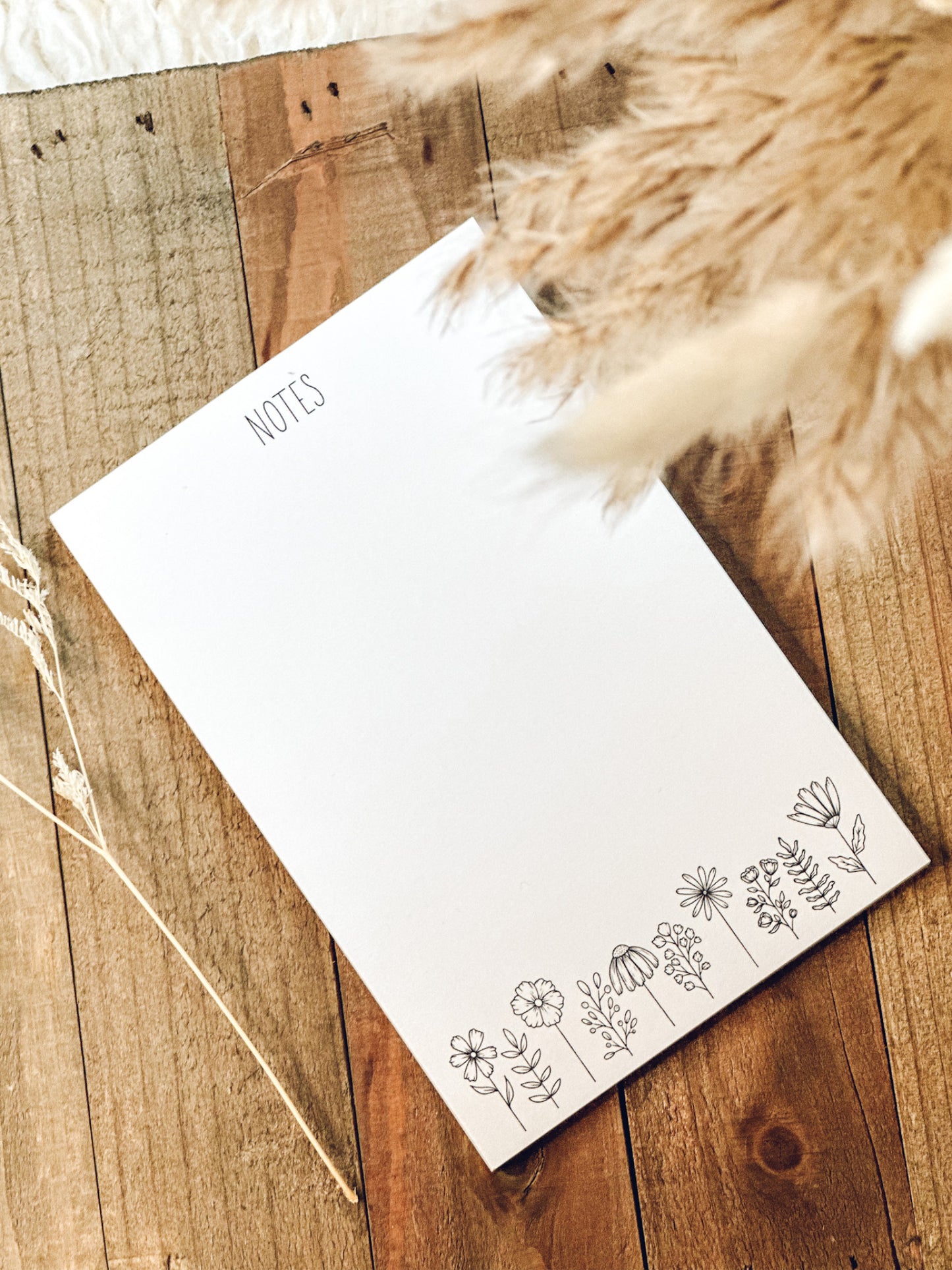 White wild flower notepad